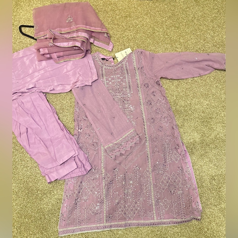 Brand new Saphire pk suit in medium with tags